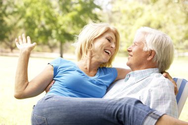 Portrait Of Senior Couple Enjoying Day In Park clipart