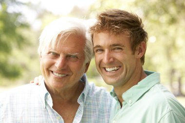 Portrait Of Senior Man With Adult Son clipart