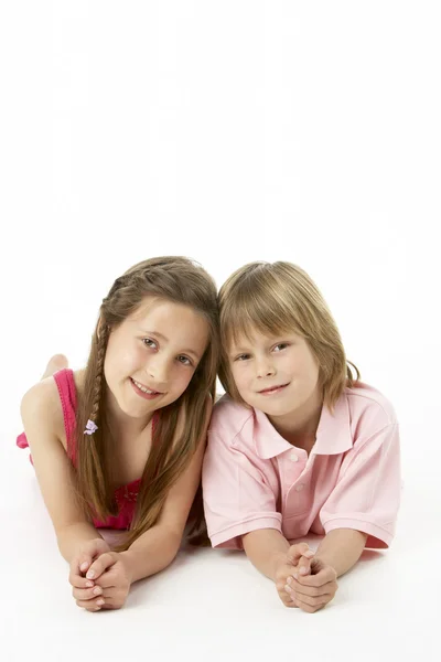 Two Children Laying Stomach Studio — Stock Photo, Image