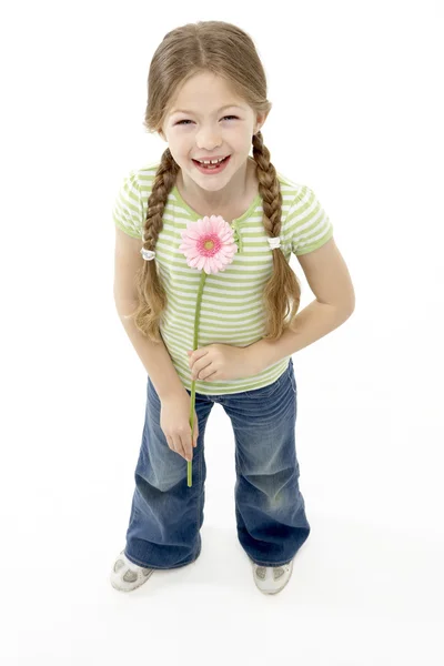 室画像的微笑女孩举行花 — 图库照片