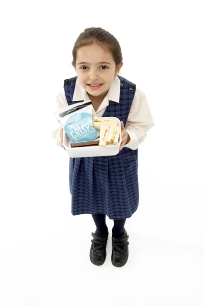 Студія портрет посміхаючись дівчинка тримає Lunchbox — стокове фото