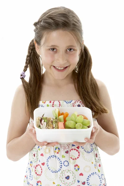 Portret uśmiechnięta dziewczynka gospodarstwa lunchbox — Zdjęcie stockowe