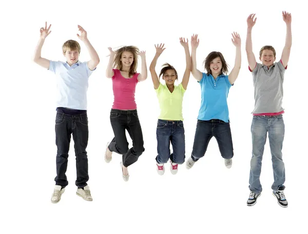 Group of Teenage Friends Jumping in Studio — Stock Photo, Image