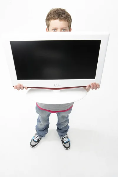 Retrato Sorrir Adolescente Menino Segurando Televisão — Fotografia de Stock