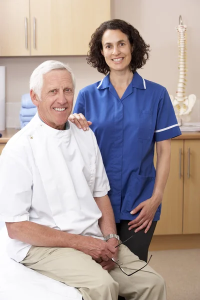 Portrait of male and female osteopath — Stock Photo, Image
