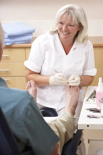 Chirpodist Treating Client Clinic — Stock Photo, Image