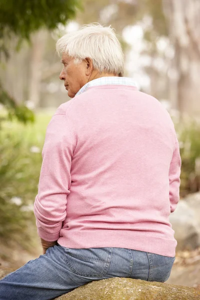 Back View Of Senior Man Sitting On Wall — Stock Photo, Image