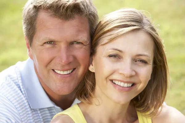 Close Middle Aged Couple Outdoors Stock Image