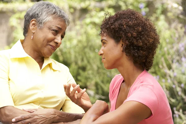 Senior Woman Being Consoled By Adult Daughter — Stock Photo, Image