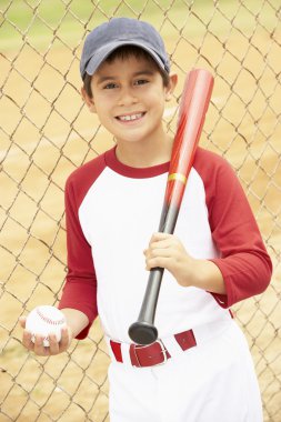 Young Boy Playing Baseball clipart