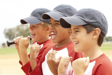 Young Boys In Baseball Team clipart