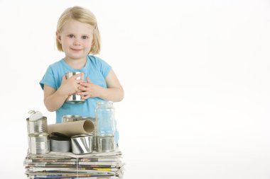 Child Helping With Recycling clipart