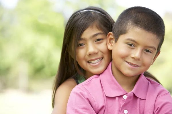 Portrait Of Brother And Sister In Park — Stock Photo, Image