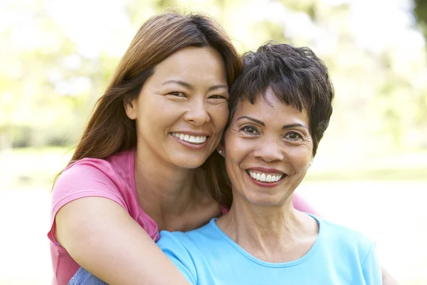 Senior Woman With Adult Daughter In Park — Stock Photo, Image