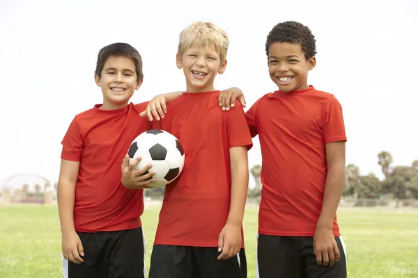 Young Boys And Girls In Football Team With Coach — Stock Photo ...