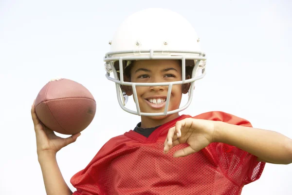 Young Boy Playing American Football — Stockfoto