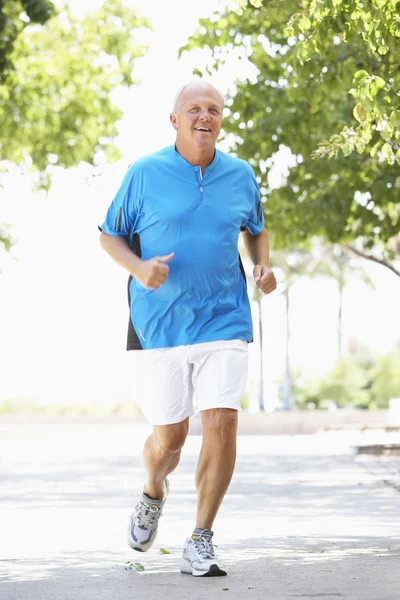 Senior Man Joggen Het Park — Stockfoto