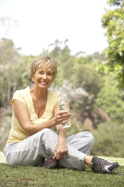 Senior Woman Relaxing After Exercise — Stock Photo, Image