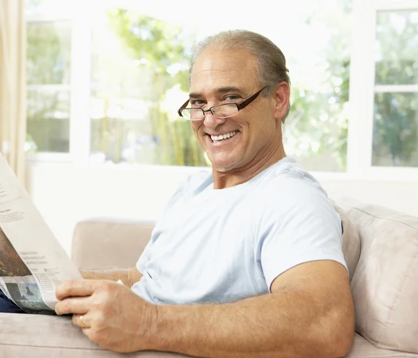 Senior Man Reading Newspaper At Home — Stock Photo, Image