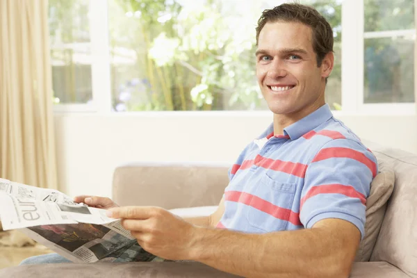 Man Reading Newspaper At Home — Stock Photo, Image