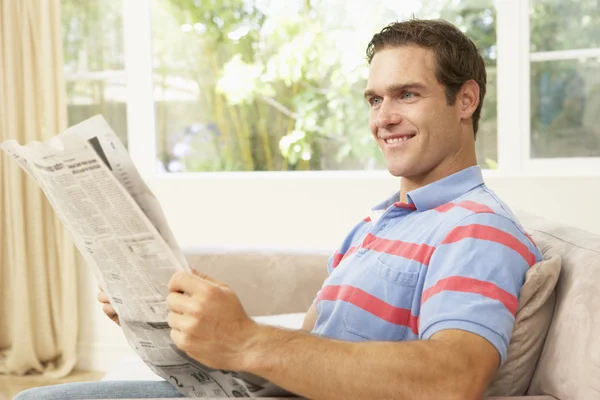 Man Reading Newspaper Home — Stock Photo, Image
