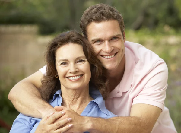 Senior Woman Being Hugged Adult Son — Stock Photo, Image