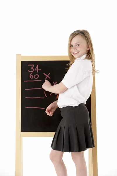Doordachte Vrouwelijke Student Dragen Uniform Naast Schoolbord — Stockfoto