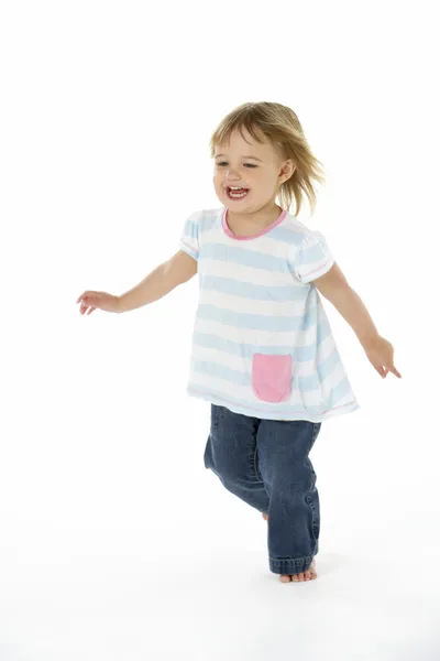 Νεαρό κορίτσι που τρέχει σε whitestudio — Φωτογραφία Αρχείου