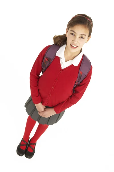 Retrato do estúdio do estudante fêmea no uniforme com mochila — Fotografia de Stock