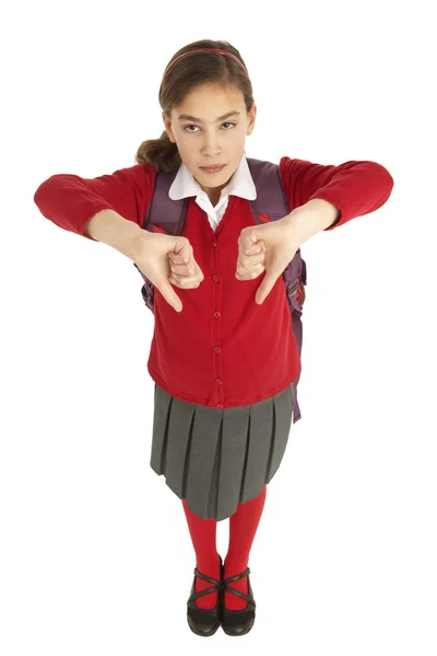 Studioporträt einer Studentin in Uniform mit Rucksack — Stockfoto