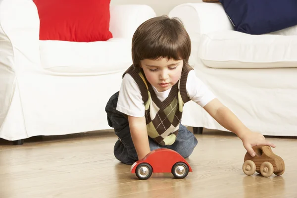 Menino Jovem Brincando Com Carros Brinquedo Casa — Fotografia de Stock
