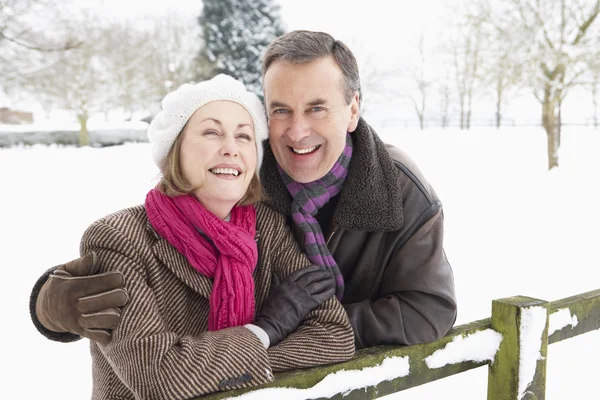 Senior Couple Standing Outside In Snowy Landscape — Stock Photo, Image
