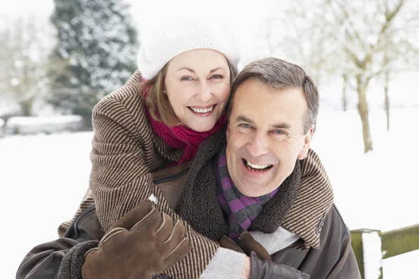 Senior Couple Standing Snowy Landscape — Stock Photo, Image