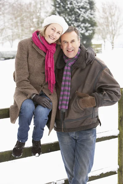 Senior Couple Standing Snowy Landscape — Stock Photo, Image