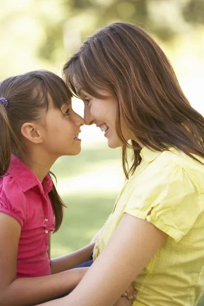 Portrait Of Mother And Daughter Together In Park Stock Photo