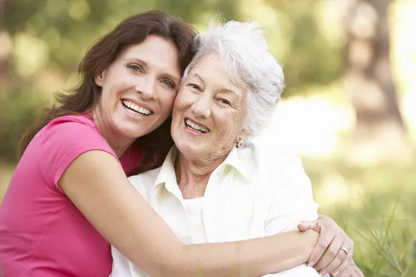 Senior Woman With Adult Stock Image