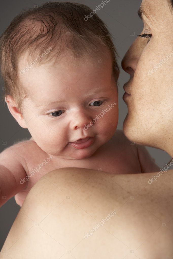 Mother Holding Newborn Baby Stock Photo By Monkeybusiness 4835811