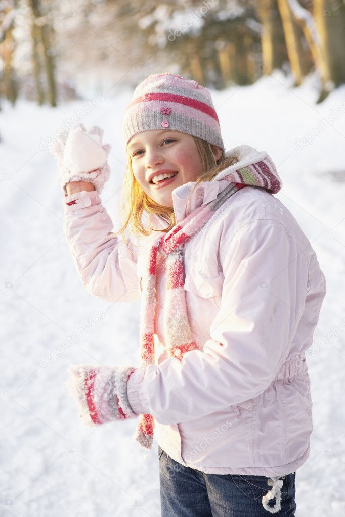 Girl About To Throw Snowball In Snowy Woodland — Stock Photo ...