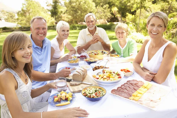 Extended Family Enjoying Meal Garden — Stock Photo, Image