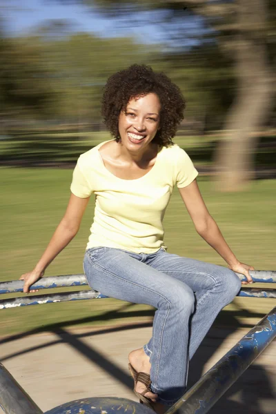 Young Woman Riding Roundabout Park — Stock Photo, Image