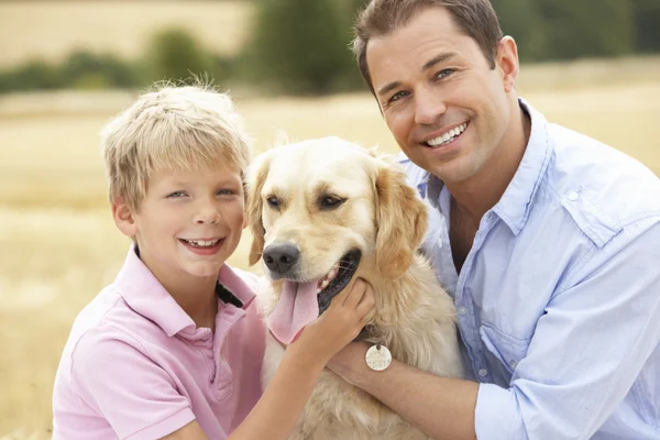 Father Son Sitting Dog Straw Bales Harvested Fiel — Stock Photo, Image