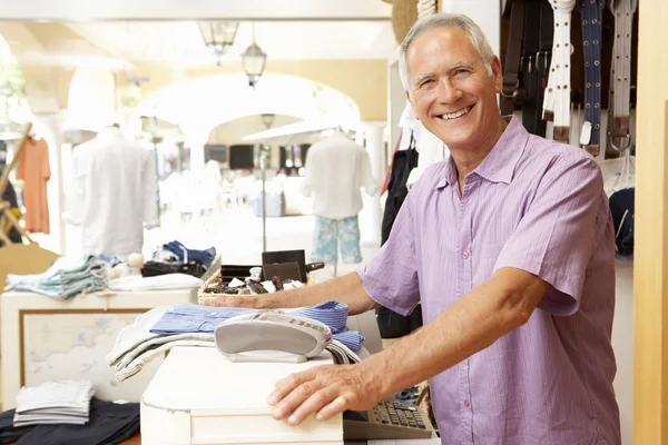 Male Sales Assistant Checkout Clothing Store — Stock Photo, Image