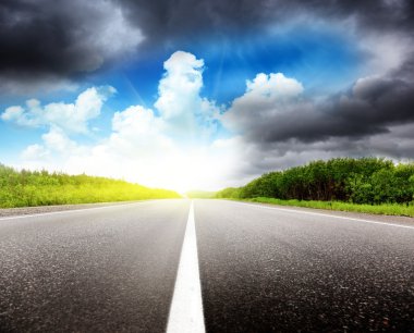 Road black clouds and sun clipart