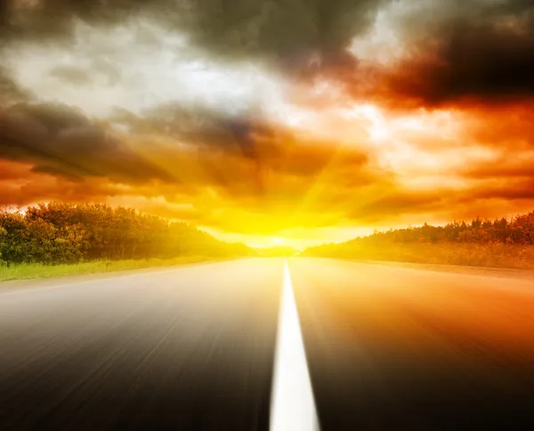 Blur road and dramatic sky — Stock Photo, Image