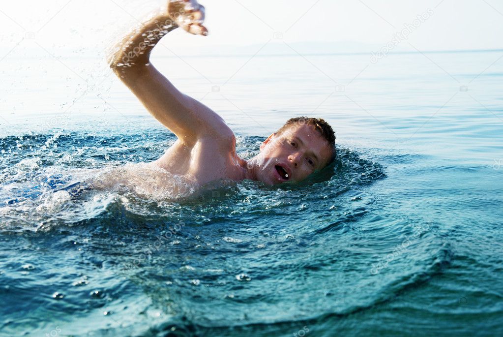 Swiming young man