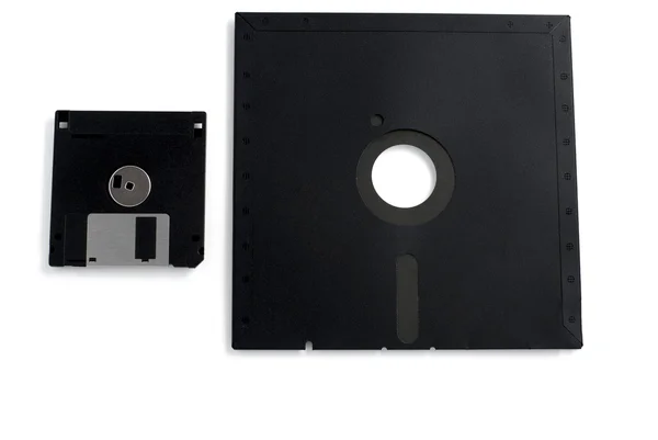 Stock image two black floppies small and large