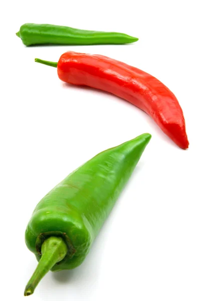 Green and red peppers — Stock Photo, Image