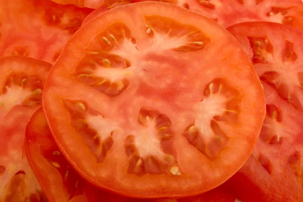 从新鲜的番茄切片的背景 — 图库照片