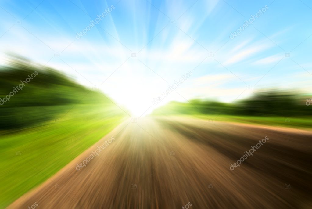Motion blur road and sun