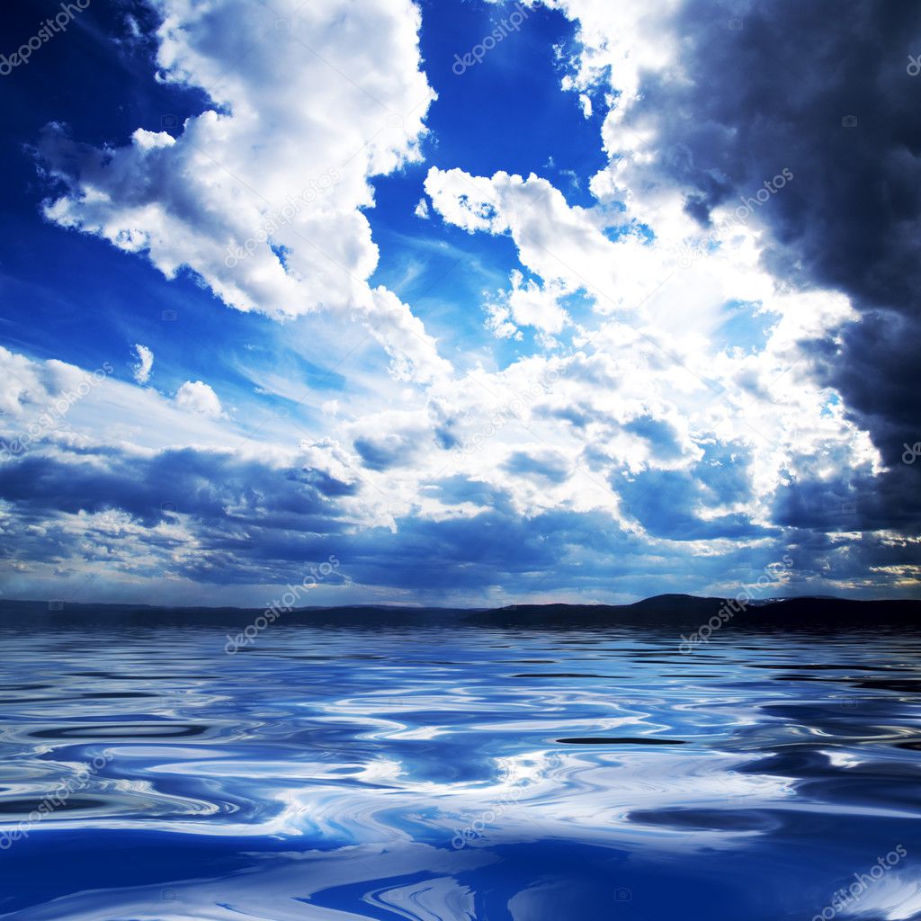 white clouds and water